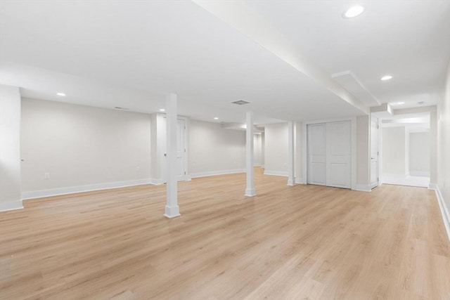 14 Corcoran Rd, Burlington, MA 01803 - finished basement featuring light wood-style floors and recessed lighting
