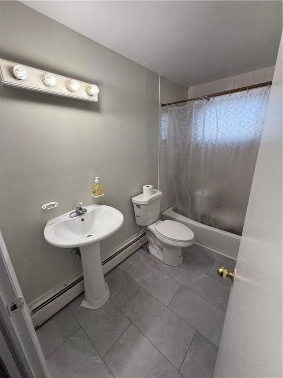 full bathroom featuring shower / bath combination with curtain, a baseboard radiator, toilet, and sink