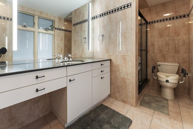 9 Dennison Rd, Worcester, MA 01609 - full bathroom with tile walls, tile patterned flooring, vanity, toilet, and a stall shower