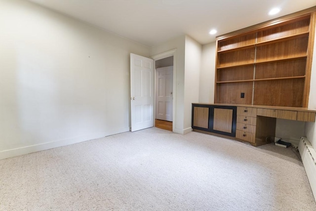 9 Dennison Rd, Worcester, MA 01609 - unfurnished office featuring carpet floors, built in study area, baseboards, recessed lighting, and a baseboard heating unit