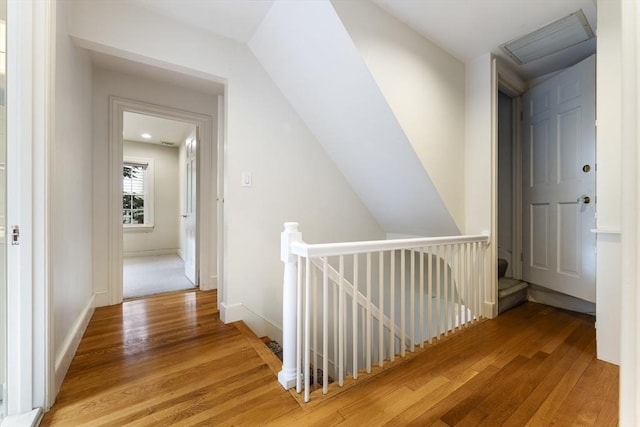 9 Dennison Rd, Worcester, MA 01609 - hallway featuring an upstairs landing, wood finished floors, and baseboards