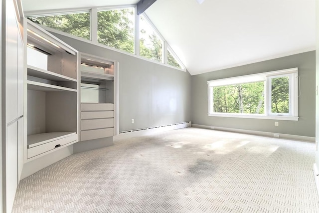 9 Dennison Rd, Worcester, MA 01609 - unfurnished living room with carpet flooring, a baseboard heating unit, high vaulted ceiling, and baseboards