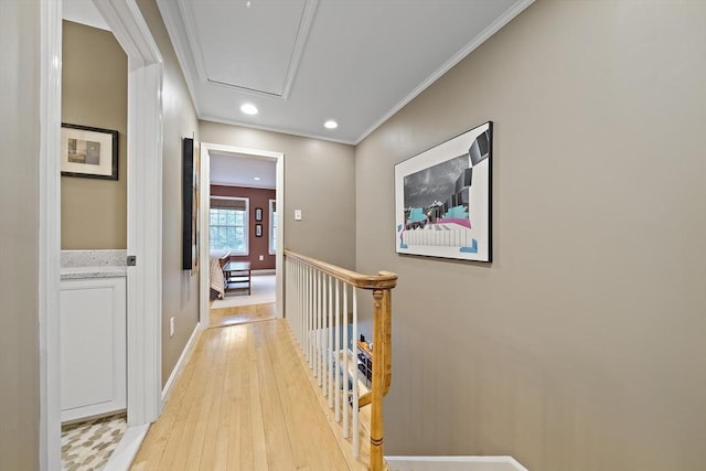 160 Pine St Unit 10, Newton, MA 02466 - corridor featuring light wood-type flooring, crown molding, an upstairs landing, recessed lighting, and baseboards