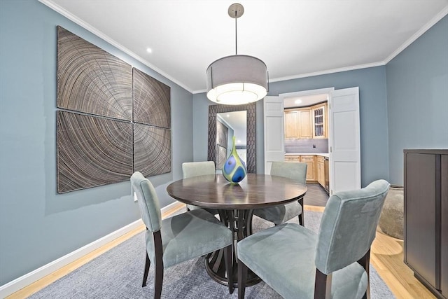 160 Pine St Unit 10, Newton, MA 02466 - dining area with light wood-style flooring, crown molding, baseboards, and recessed lighting