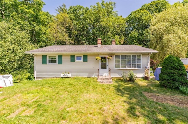121 E St, Southampton, MA 01073 - view of front facade featuring a chimney and a front lawn