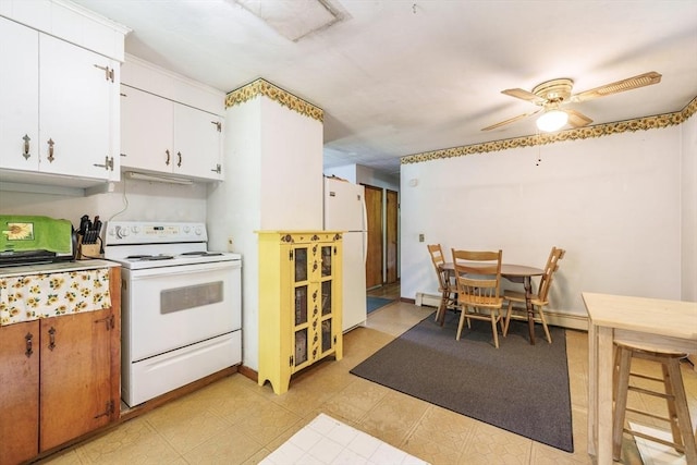 121 E St, Southampton, MA 01073 - kitchen featuring white appliances, white cabinetry, a ceiling fan, and light countertops