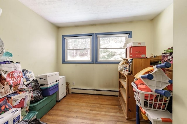 121 E St, Southampton, MA 01073 - storage room featuring a baseboard heating unit