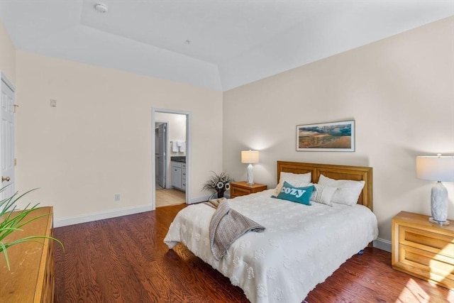22 Grey Hawk Dr Unit 22, Mashpee, MA 02649 - bedroom with baseboards, connected bathroom, and wood finished floors