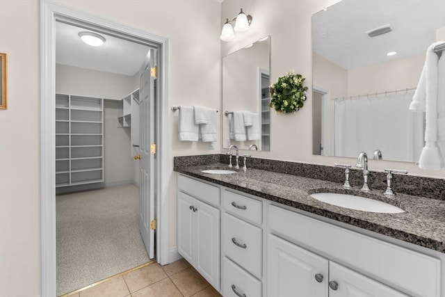 22 Grey Hawk Dr Unit 22, Mashpee, MA 02649 - full bathroom with tile patterned floors, a sink, and a walk in closet