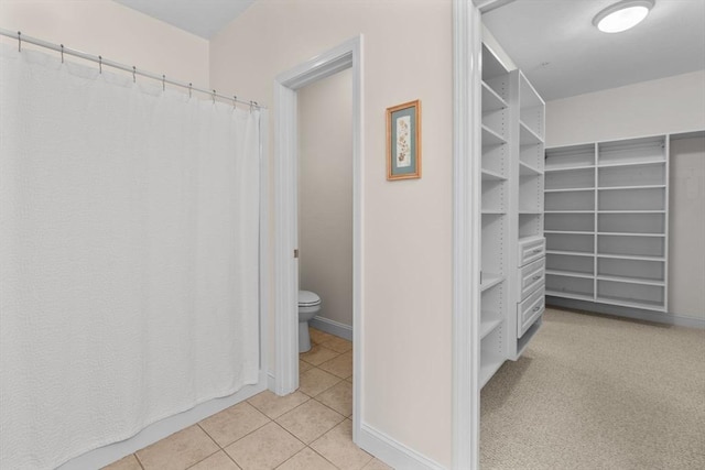 22 Grey Hawk Dr Unit 22, Mashpee, MA 02649 - full bath featuring toilet, tile patterned floors, a walk in closet, and baseboards