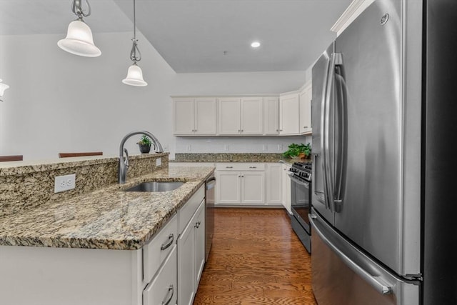 22 Grey Hawk Dr Unit 22, Mashpee, MA 02649 - kitchen featuring a sink, dark wood-style floors, white cabinets, and stainless steel appliances