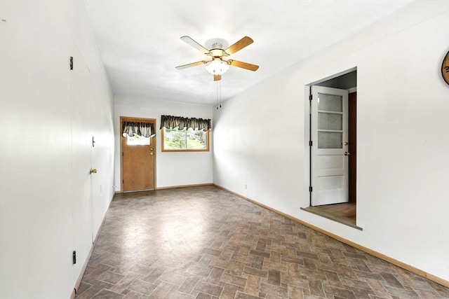 25 Saybrook Cir, South Hadley, MA 01075 - spare room featuring a ceiling fan and baseboards
