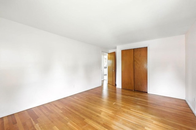 25 Saybrook Cir, South Hadley, MA 01075 - empty room with light wood finished floors and baseboards