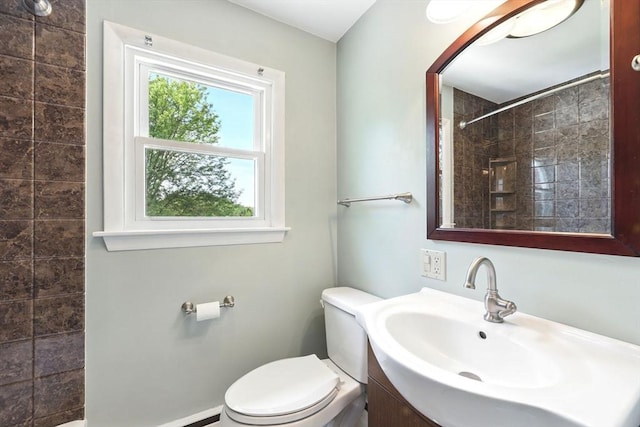 25 Saybrook Cir, South Hadley, MA 01075 - bathroom with vanity, a tile shower, and toilet