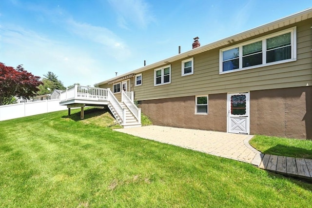 25 Saybrook Cir, South Hadley, MA 01075 - back of house with stairs, a deck, and a chimney