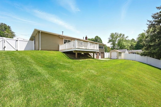 25 Saybrook Cir, South Hadley, MA 01075 - rear view of property with a deck, a chimney, and a gate