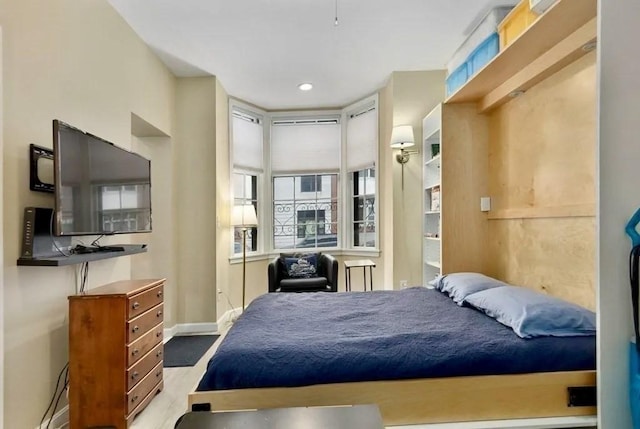 bedroom featuring hardwood / wood-style flooring