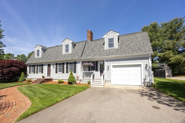 67 Jacap Dr, North Attleboro, MA 02760 - view of front facade with asphalt driveway, a front yard, a chimney, an attached garage, and a shingled roof