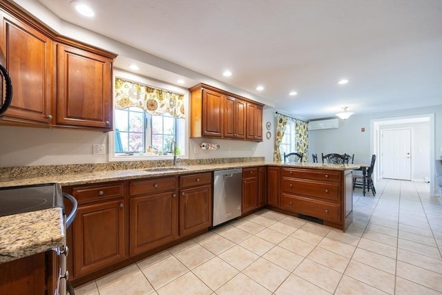 67 Jacap Dr, North Attleboro, MA 02760 - kitchen featuring appliances with stainless steel finishes, a sink, a peninsula, recessed lighting, and light tile patterned floors