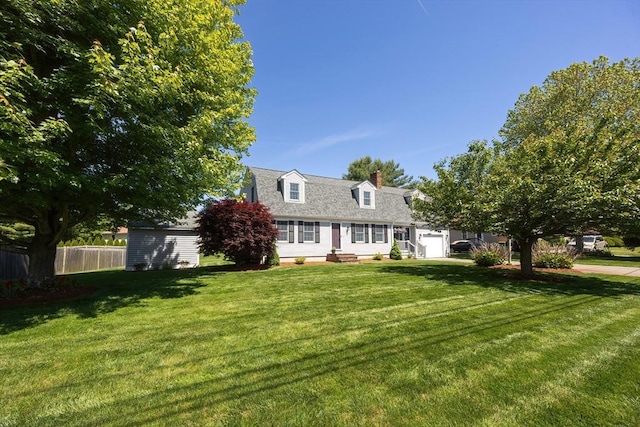 67 Jacap Dr, North Attleboro, MA 02760 - view of front facade with a chimney, a garage, and a shingled roof