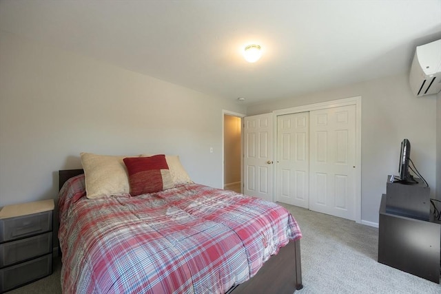 67 Jacap Dr, North Attleboro, MA 02760 - bedroom with carpet flooring, a wall unit AC, a closet, and baseboards