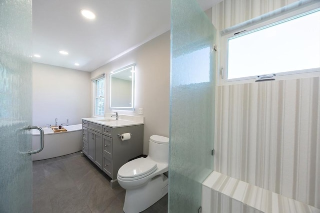 67 Jacap Dr, North Attleboro, MA 02760 - full bath featuring a bath, vanity, toilet, tile patterned flooring, and recessed lighting