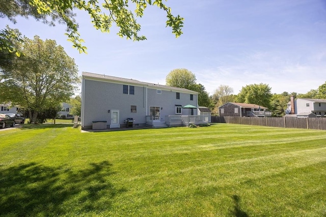 67 Jacap Dr, North Attleboro, MA 02760 - rear view of house with a deck