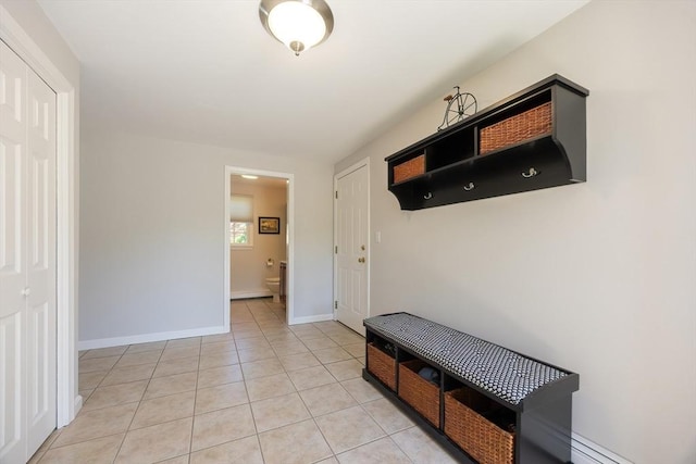 67 Jacap Dr, North Attleboro, MA 02760 - mudroom with light tile patterned floors and baseboards