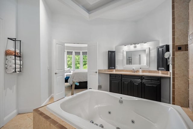 31 Cedar St, North Reading, MA 01864 - bathroom featuring a jetted tub, vanity, ensuite bathroom, and tile patterned flooring