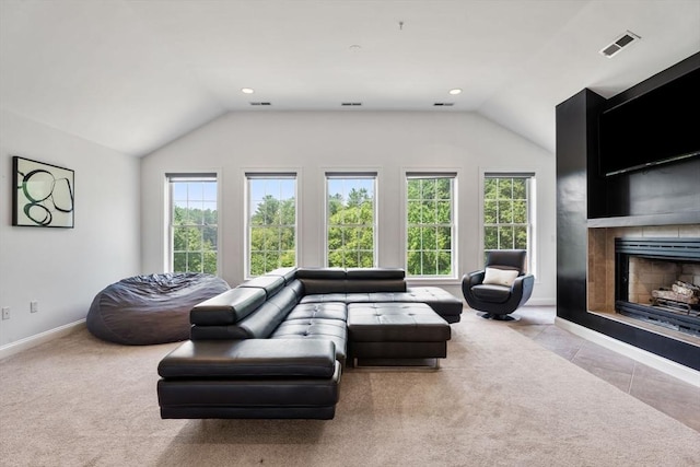 31 Cedar St, North Reading, MA 01864 - living area featuring lofted ceiling, a fireplace with flush hearth, and recessed lighting
