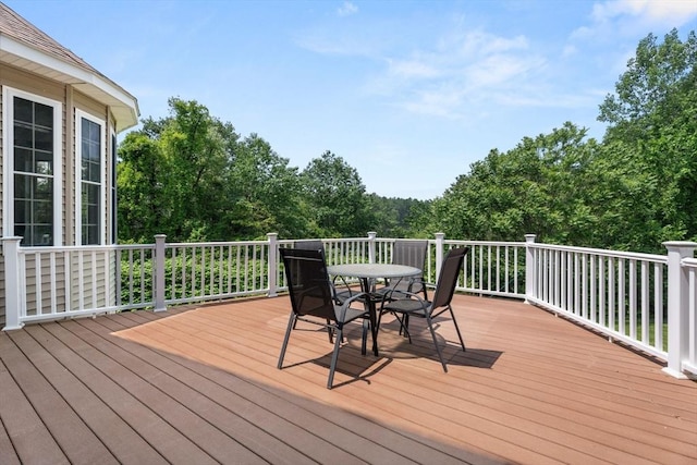 31 Cedar St, North Reading, MA 01864 - wooden deck featuring outdoor dining area