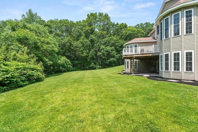 31 Cedar St, North Reading, MA 01864 - view of green lawn with a deck