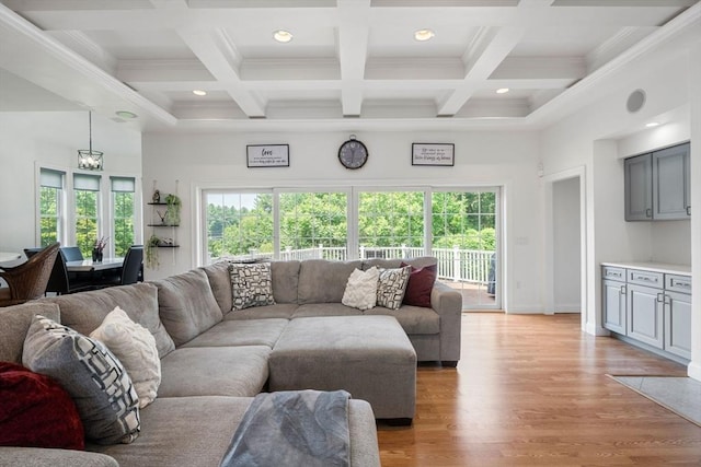 31 Cedar St, North Reading, MA 01864 - living room featuring light wood-style floors, beamed ceiling, coffered ceiling, crown molding, and recessed lighting