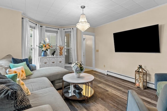 27-1/2 7th Ave, Haverhill, MA 01830 - living room featuring crown molding, wood finished floors, a baseboard radiator, and a chandelier