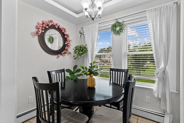 27-1/2 7th Ave, Haverhill, MA 01830 - dining room featuring a baseboard heating unit, a chandelier, and light tile patterned flooring