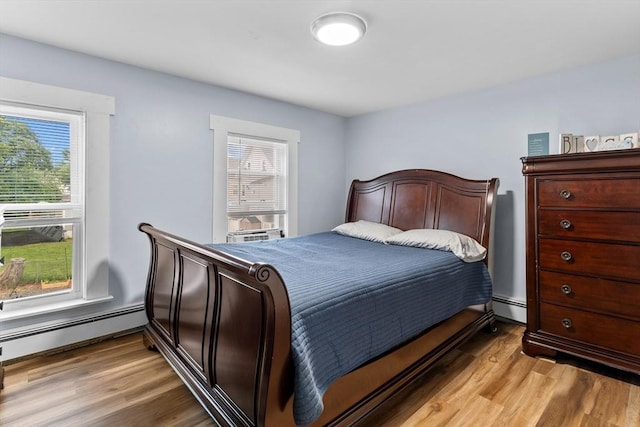 27-1/2 7th Ave, Haverhill, MA 01830 - bedroom featuring baseboard heating and light wood-style flooring