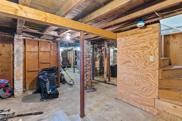 27-1/2 7th Ave, Haverhill, MA 01830 - unfinished below grade area featuring stairway and gas water heater
