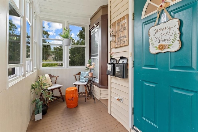 27-1/2 7th Ave, Haverhill, MA 01830 - sunroom / solarium featuring wood-type flooring and wooden walls