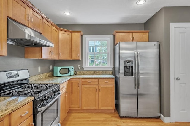 1 Chase Path Unit 1, Acton, MA 01720 - kitchen with appliances with stainless steel finishes, under cabinet range hood, light wood-style floors, light stone countertops, and recessed lighting