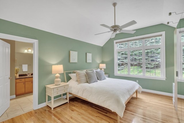 1 Chase Path Unit 1, Acton, MA 01720 - bedroom featuring vaulted ceiling, baseboards, light wood-type flooring, connected bathroom, and a ceiling fan