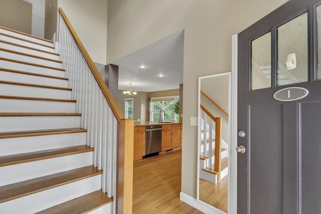 1 Chase Path Unit 1, Acton, MA 01720 - foyer entrance with stairway, light wood-style flooring, a chandelier, and recessed lighting
