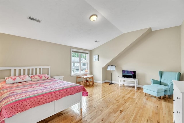 1 Chase Path Unit 1, Acton, MA 01720 - bedroom with lofted ceiling, light wood-style floors, and baseboards