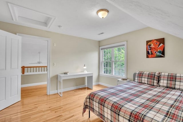 1 Chase Path Unit 1, Acton, MA 01720 - bedroom with attic access, wood finished floors, and baseboards