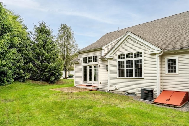 1 Chase Path Unit 1, Acton, MA 01720 - rear view of property with central AC unit, a yard, french doors, and roof with shingles