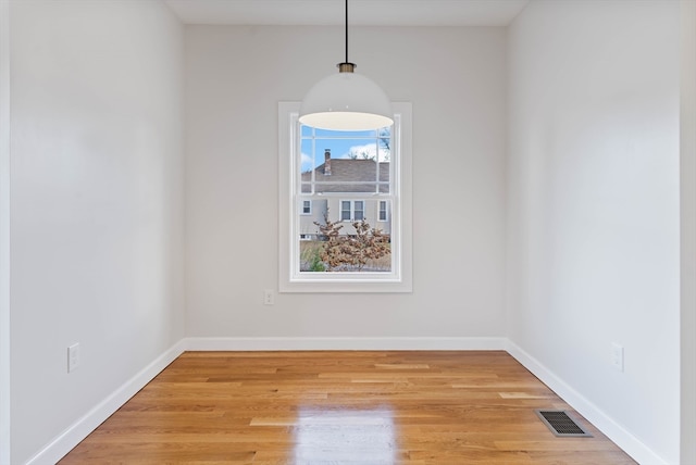 empty room featuring light hardwood / wood-style floors