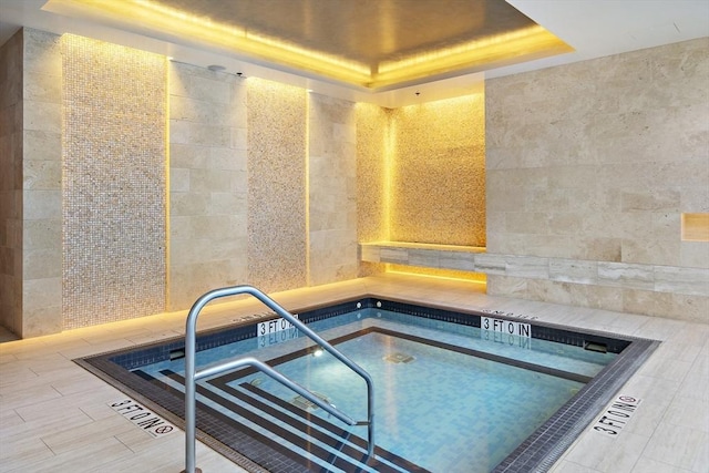 view of pool featuring an indoor in ground hot tub