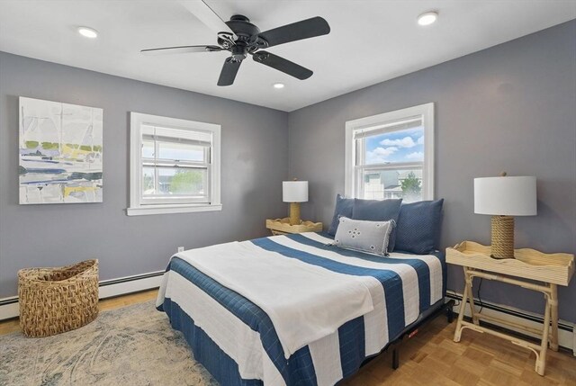 129 Northern Blvd, Newbury, MA 01951 - bedroom featuring multiple windows, a baseboard heating unit, baseboard heating, a ceiling fan, and recessed lighting