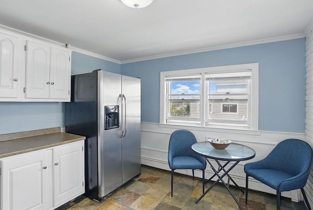 129 Northern Blvd, Newbury, MA 01951 - kitchen featuring stainless steel refrigerator with ice dispenser, stone finish flooring, white cabinets, crown molding, and wainscoting