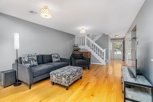 706 Ridgefield Cir Unit A, Clinton, MA 01510 - living area with stairway and light wood-style floors