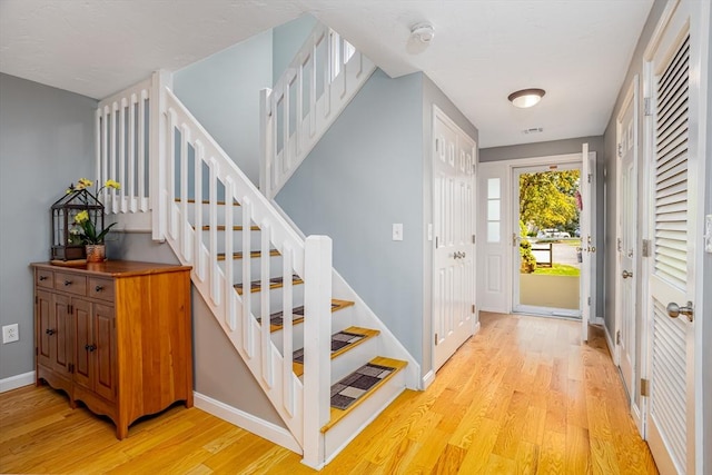 706 Ridgefield Cir Unit A, Clinton, MA 01510 - entryway featuring light wood-style floors and stairs